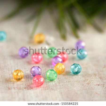 holiday background - scattered bright New Year\'s beads