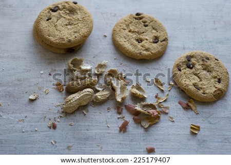 Round cookies with chocolate chips on a wooden Board