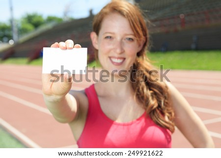 fitness, park, technology and sport concept - smiling woman with tablet pc computer