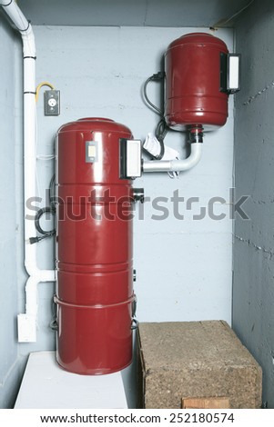 An red air cleaner system at home.