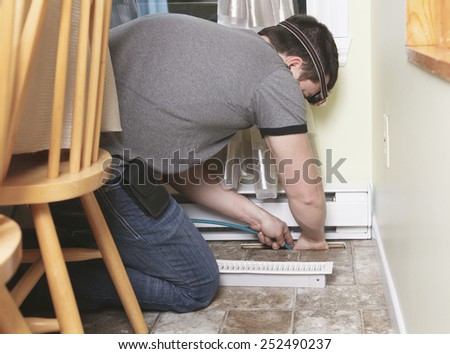 A ventilation cleaner man at work with tool