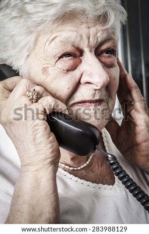 Sad senior phone
