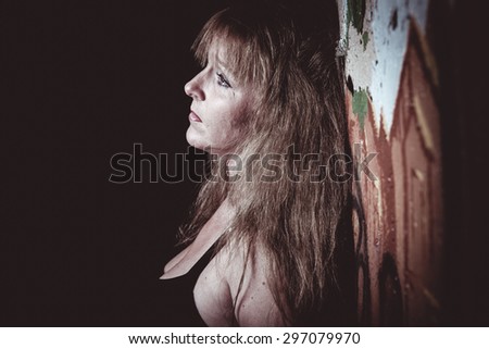 A woman having bad time in a tunnel