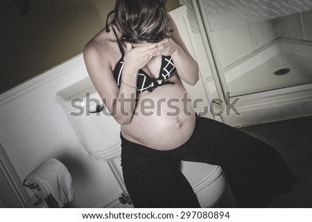 A Pregnant woman having morning sickness during Pregnancy