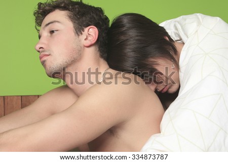 A Young couple who having hard time in bed.
