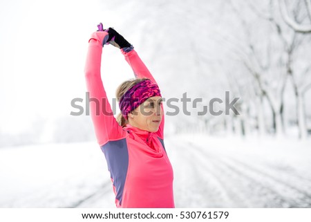 A Fitness running woman in winter season