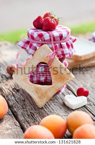 fruit jam with fresh fruits and heart shaped toast