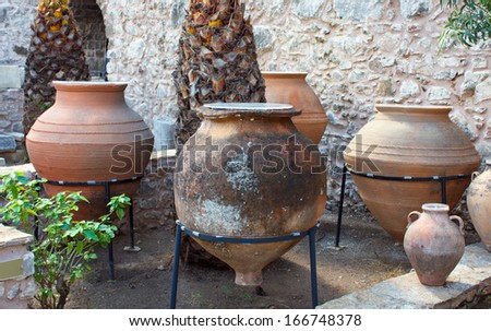 Giant ancient amphoras in fortress-museum courtyard in Marmaris, Turkey