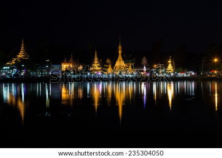 Burmese Architectural Style of Wat Chong Klang (r) and Wat Chong Kham (l) at dusk. Mae Hong Son, Northern Thailand