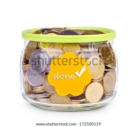 Glass bank for tips with money isolated on white