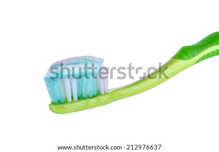 Toothbrush with toothpaste isolated on white