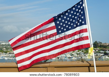NEWPORT BEACH, CA - MAY 22: 1776 United States flags were flown in honor of all military, law enforcement, fire and first responders at Castaways Park on May 22, 2011 in Newport Beach, California.