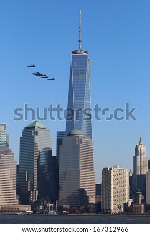 NEW YORK CITY - December 13, 2013: The US Navy Blue Angels Fly Past 1 World Trade Center, in New York City, NY.
