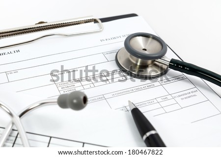 pen and stethoscope on blank Patient information