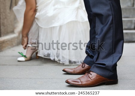 Bride and groom's feet on wedding day