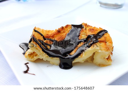 Shortcrust pastry made with oil, flour, eggs, lard, sugar, cinnamon and covered with chocolate. Traditional sweet with Arabic influence from the area of Xativa in Valencia, Spain, \