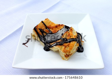 Shortcrust pastry made with oil, flour, eggs, lard, sugar, cinnamon and covered with chocolate. Traditional sweet with Arabic influence from the area of Xativa in Valencia, Spain, 