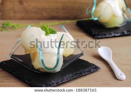 Melon balls with mint-flavored yogurt