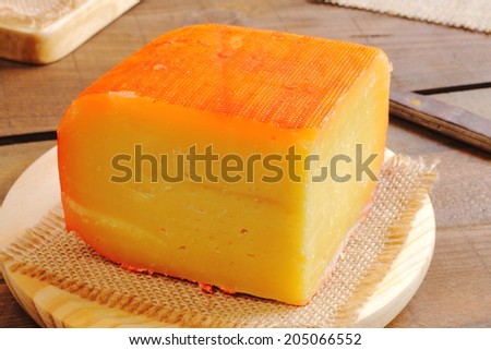 Traditional piece of semi matured cheese