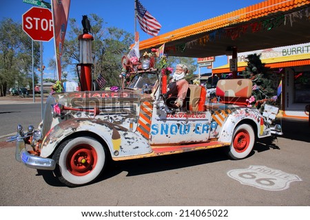 SELIGMAN, ARIZONA - AUGUST 16, 2014: Eccentric car parked on Mother Road, on August 16, 2014 in Seligman, AZ. Seligman is famous as origin of Route 66 and inspiration for the town of the movie Cars.