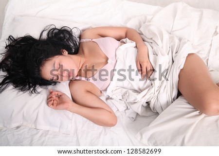 asian yung woman sleeping on bed wearing sexy underwear
