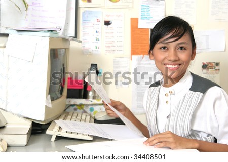 stock photo girl smile in her bussy time at work