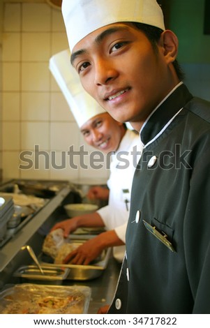 two chef smile happy at work