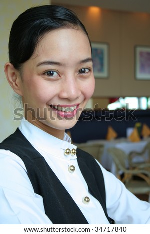 hotel restaurant staff smile at work