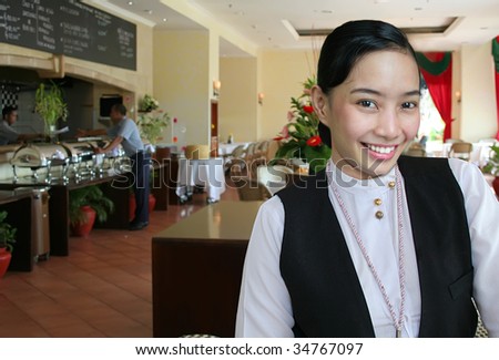 hotel restaurant staff pose at work