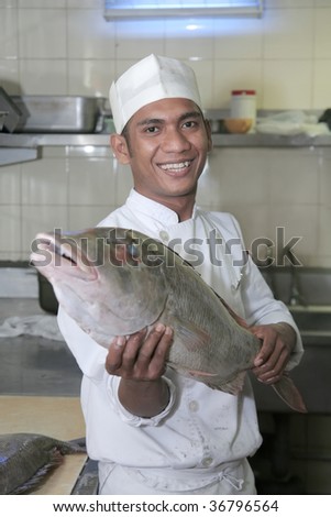 chef at butcher smiling