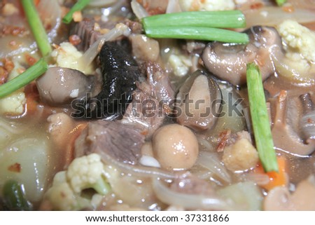 Cut of lamb meats and mushrooms food