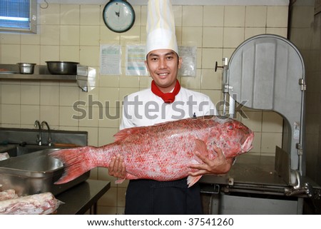 chef wirh snapper big fish