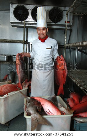 chef wirh snapper big fish