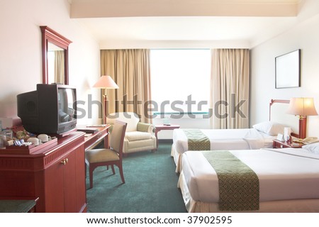 hotel room with CRT tv