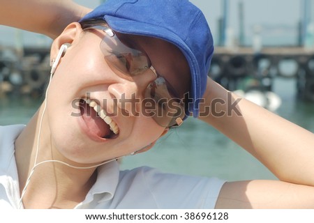 asian woman cheerful at beach at hot day