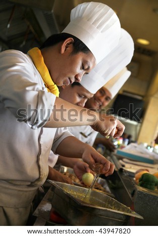 chefs working in the kitchen