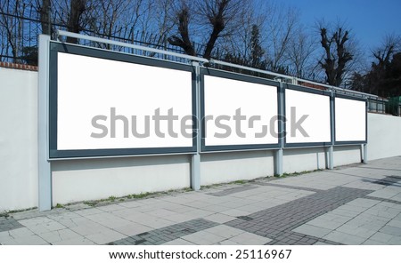 several advertising wall  boards at the street