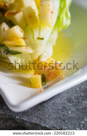 Romaine lettuce hearts with mango apple vinaigrette.