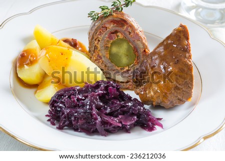 Roulade of beef with potatoes and red cabbage.