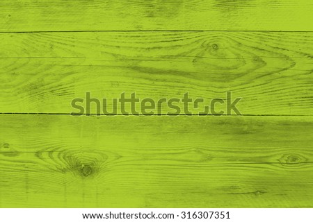 Bright green wood structure as a background texture.