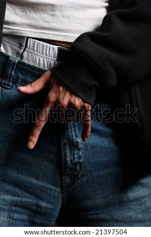 A guy in blue jeans makes an \