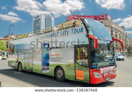 BUCHAREST, ROMANIA - MAY 15: Bucharest City Tour Bus on May 15, 2013 in Bucharest, Romania. The bus offers tourists visiting Bucharest a complete tour of the most important landmarks in town.