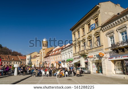 BRASOV, ROMANIA - NOVEMBER 02: Council Town Square on November 02, 2013 in Brasov, Romania. It has been the place for annual markets since 1364 being visited by merchants from the country and abroad.