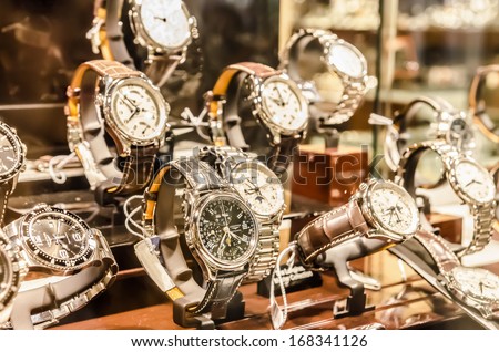 Bucharest, Romania - November 16, 2012: Longines Watches In Shop Window Display. Founded In 1832 It Is A Luxury Watches House Based In Switzerland, Its Logo Is The Oldest Registered For A Watchmaker.