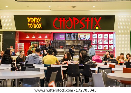 BUCHAREST ROMANIA JANUARY 24 People buying chinese food from Chopstix Restaurant on January 24 2014 in Bucharest Romania Chopstix is one of the main chinese food restaurant chain in Romania BUCHAREST ROMANIA JANUARY 24 People buying chinese food from Chopstix Restaurant on January 24 2014 in Bucharest Romania Chopstix is one of the main chinese food restaurant chain in Romania