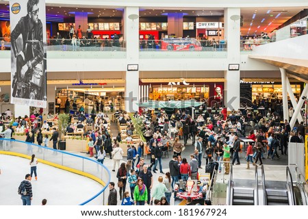 BUCHAREST, ROMANIA - MARCH 16: People Crowd On Restaurant Floor In Luxurious Shopping Mall on March 16, 2014 in Bucharest, Romania.