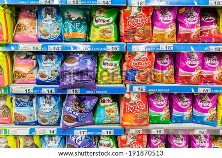 BUCHAREST, ROMANIA - MAY 05: Cat Food Products On Animals Supermarket Shelf on May 05, 2014 in Bucharest, Romania.