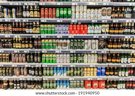 BUCHAREST, ROMANIA - MAY 08: Beer Cans On Supermarket Shelf on May 08, 2014 in Bucharest, Romania.