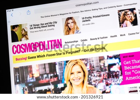 BUCHAREST, ROMANIA - JUNE 24, 2014: Cosmopolitan Magazine On Apple iPad Tablet. It was first published in 1886 in the United States as a family magazine and now is an international magazine for women.