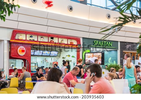 BUCHAREST, ROMANIA - JULY 08: People Eating At Fast Food Restaurants In Luxurious Shopping Mall on July 08, 2014 In Bucharest, Romania.